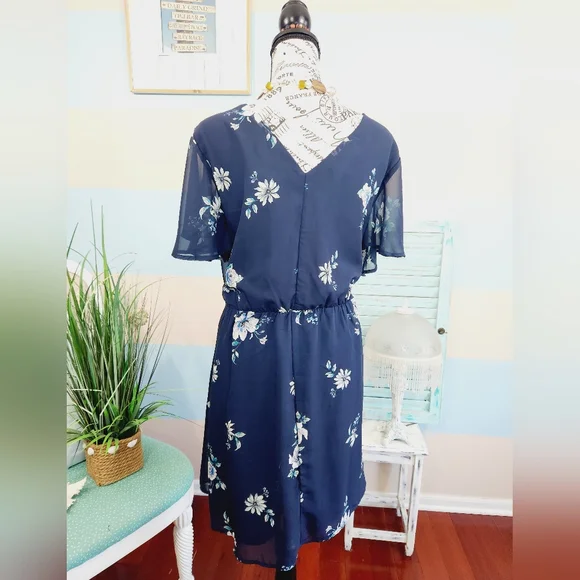 25. Maurices Plus Size Ruffled Floral Wrap Dress - Picture 5 of 7